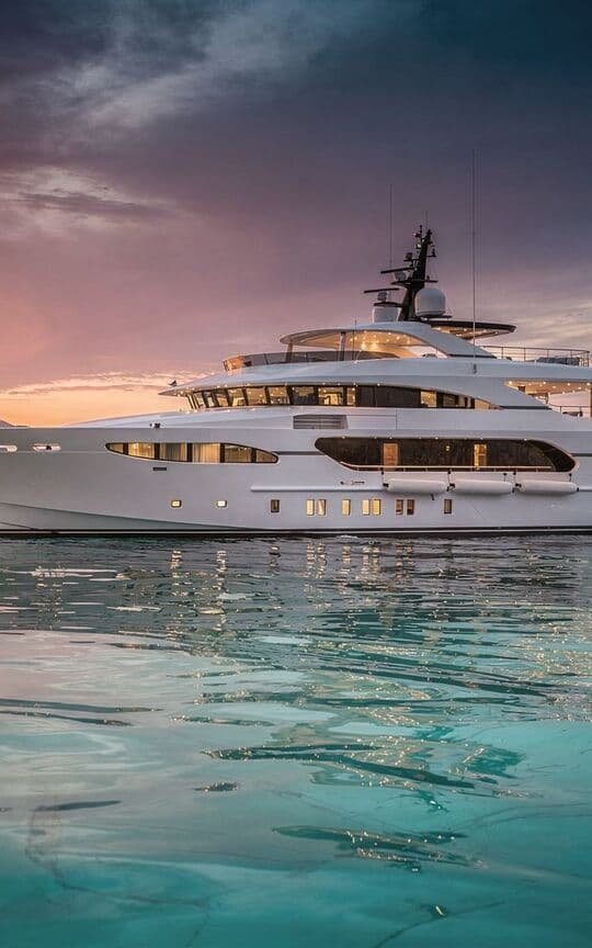 Luxury superyacht at sunset in Mediterranean