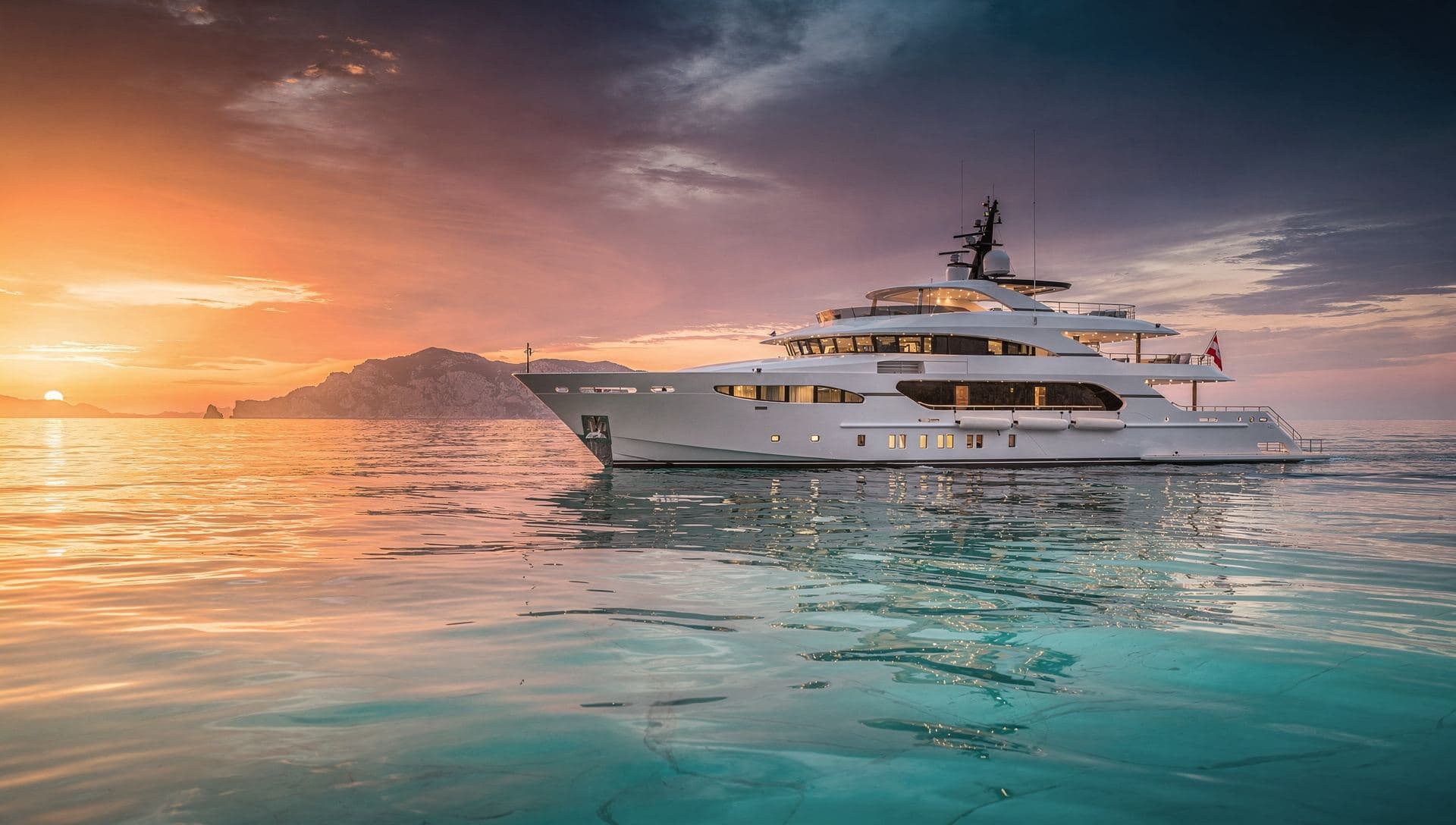 Luxury superyacht at sunset in Mediterranean